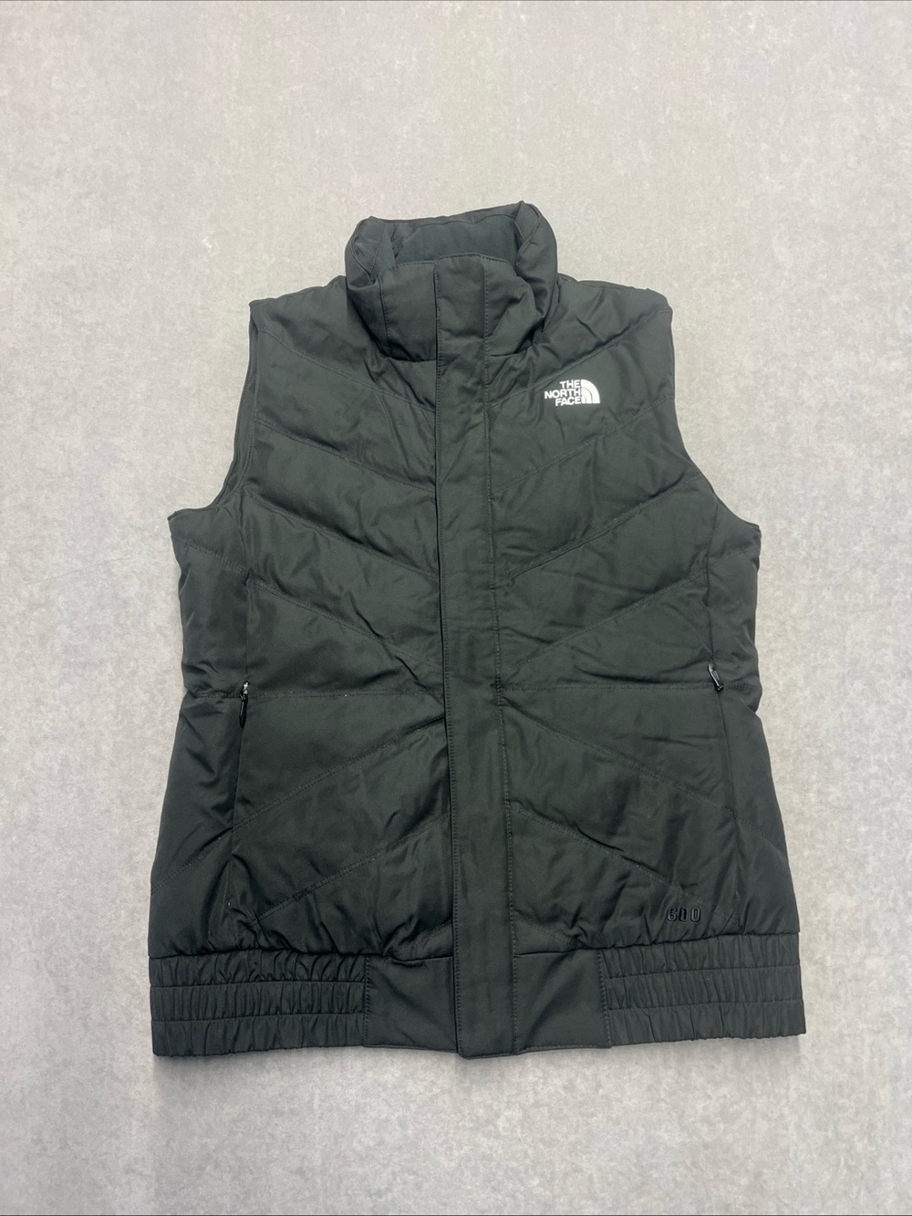 The North Face Kids Black Puffer Vest with High Collar